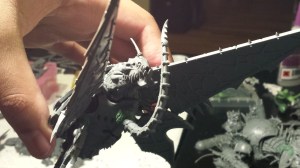 The underside, once the greenstuff had cured enough to moor the lure in place.