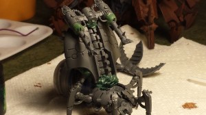 Some clipping and greenstuffing let me turn the smokestacks from the soul grinder kit into some flame-ready rockets.